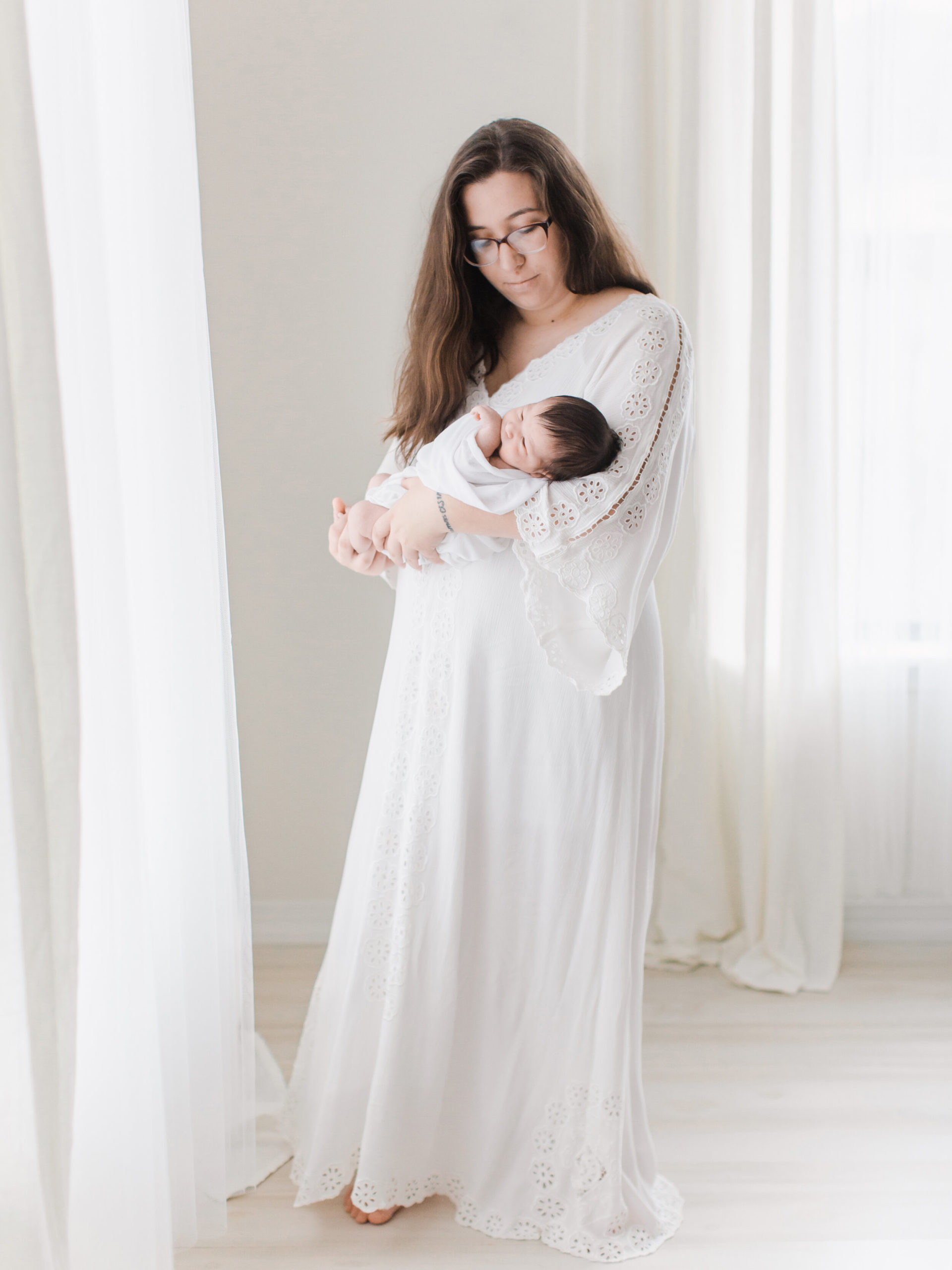 Newborn portraits in white fillyboo dress