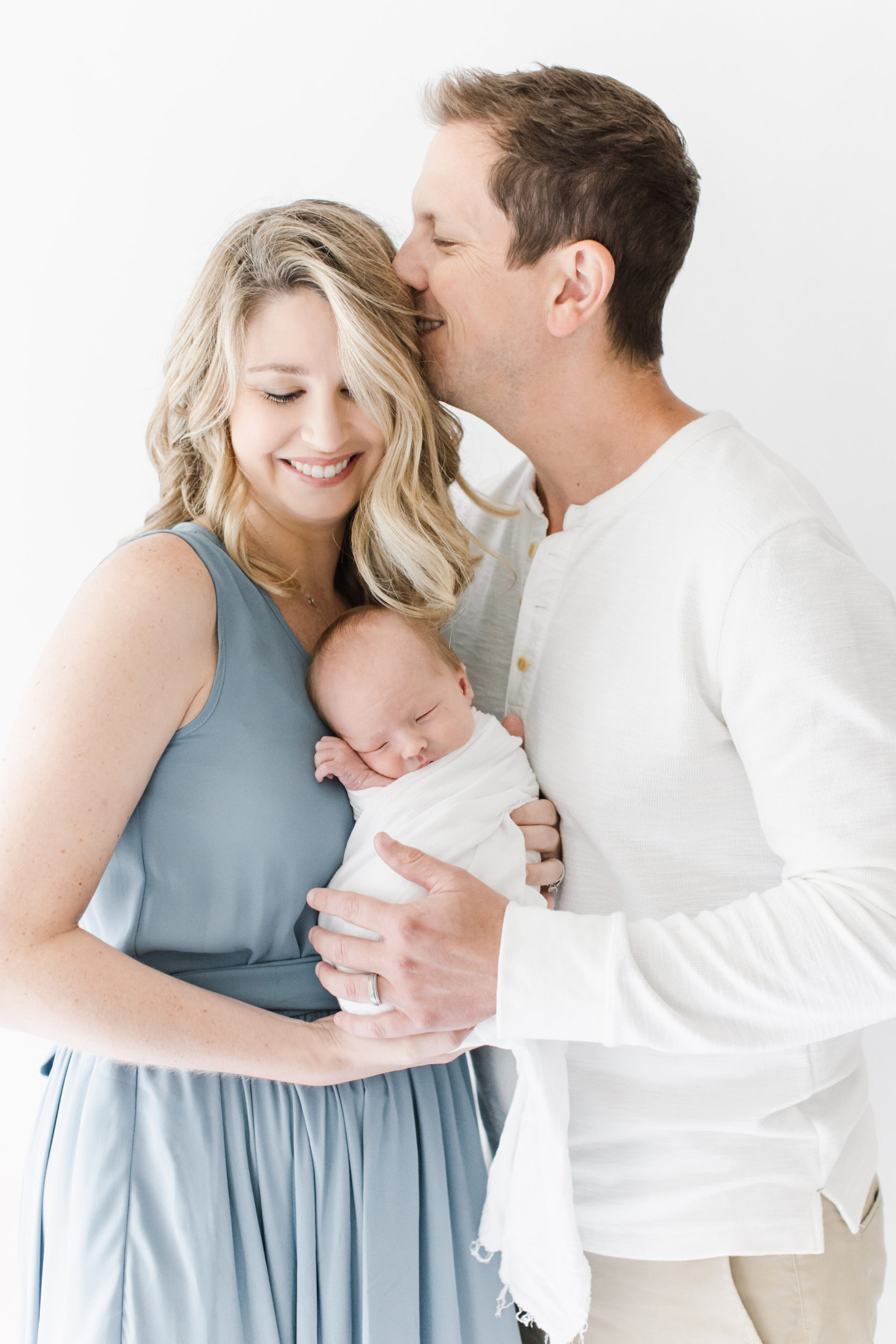 sweet newborn portrait with parents